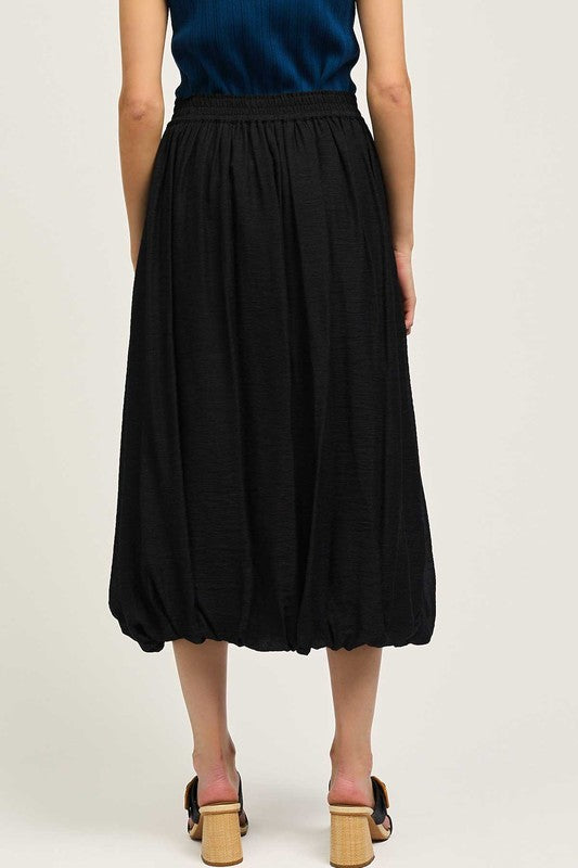 Smocked Waist Bubble Midi Skirt in Black