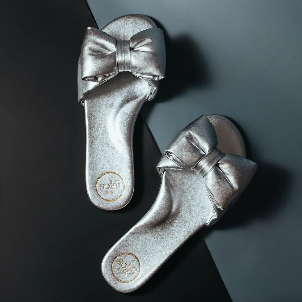 Rafie Bow Slide Sandal in Metallic Silver
